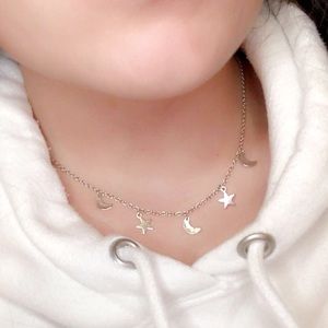Silver moon and star choker